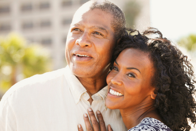 Image of couple smiling near Capital Dental Center.